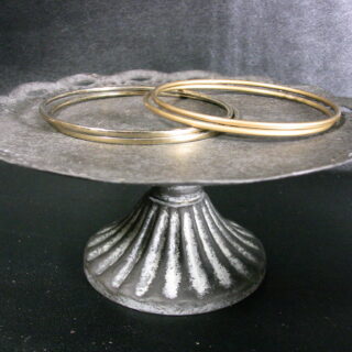 Four brass bracelets